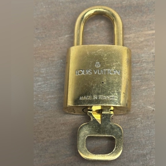 Authentic Louis Vuitton Lock Key Burnt Orange Cat Tassel, Bag Charm,Key Chain - Picture 7 of 9